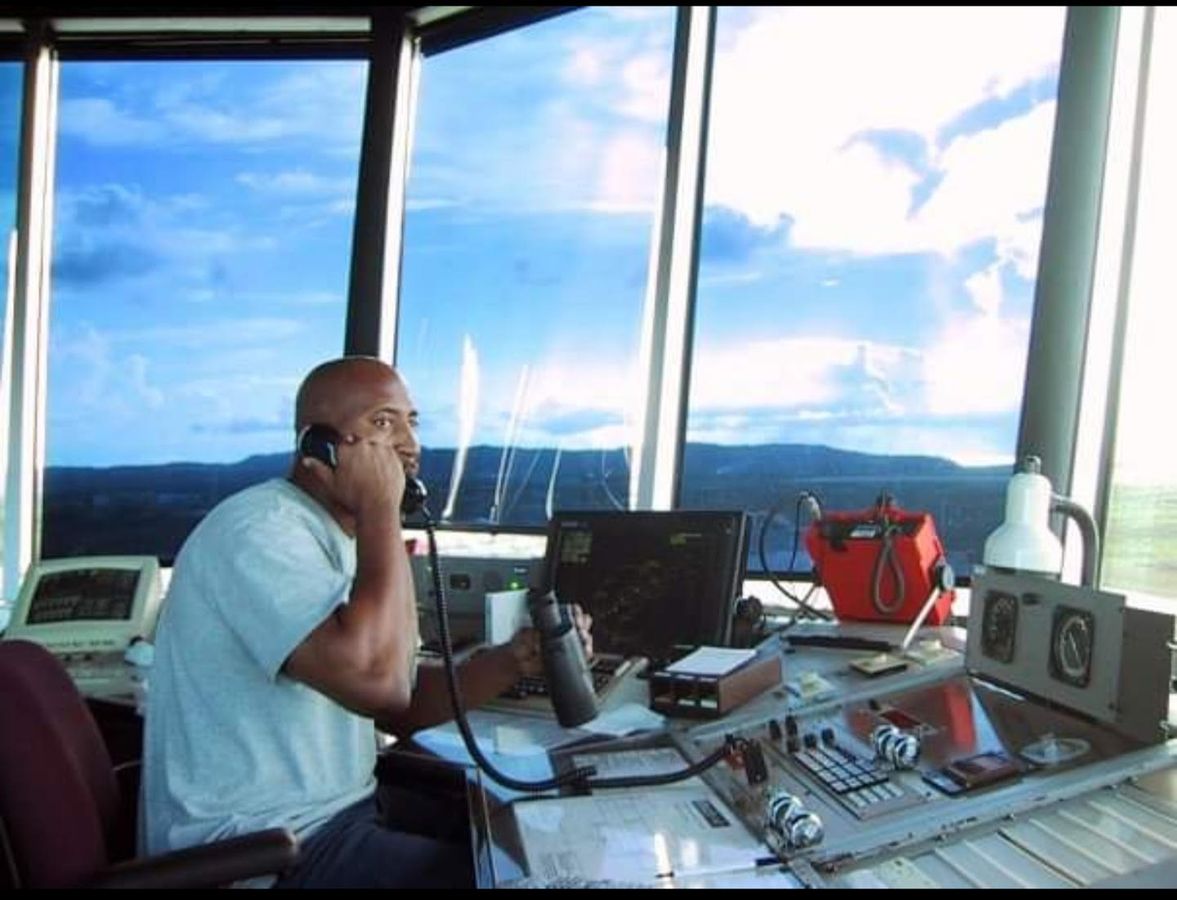 Dr. Worthington coordinating on voice line with radar display.