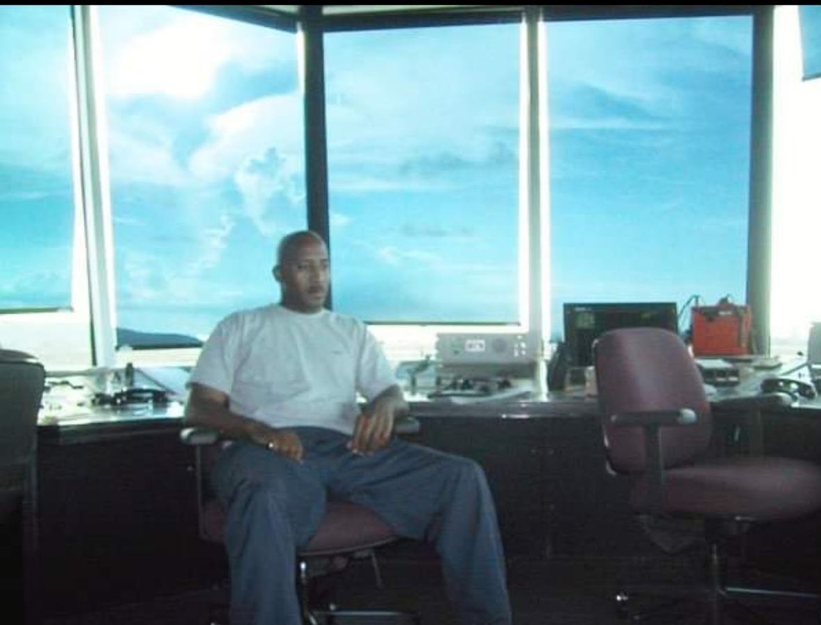 Dr. Worthington at the controller position — tower operations.